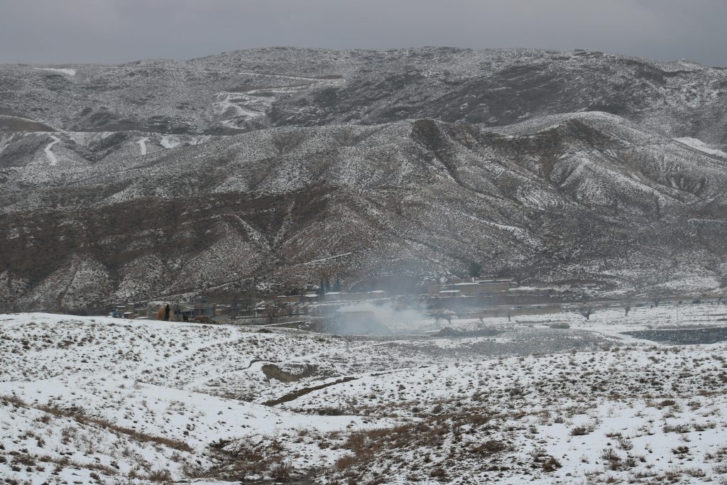 A scenic view of snow-covered hills in Quetta, offering a serene winter landscape.